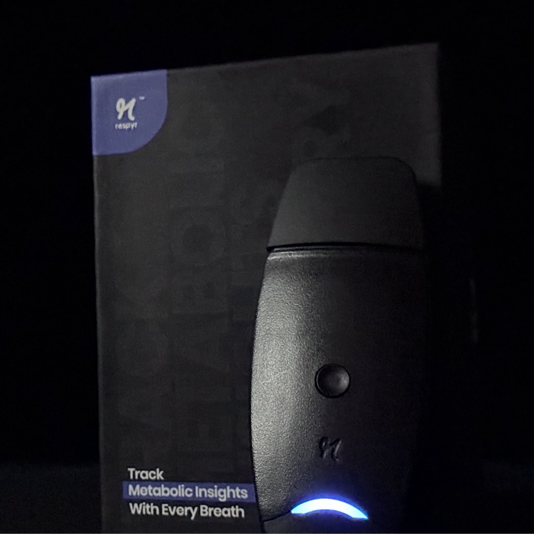 Show the device with its box